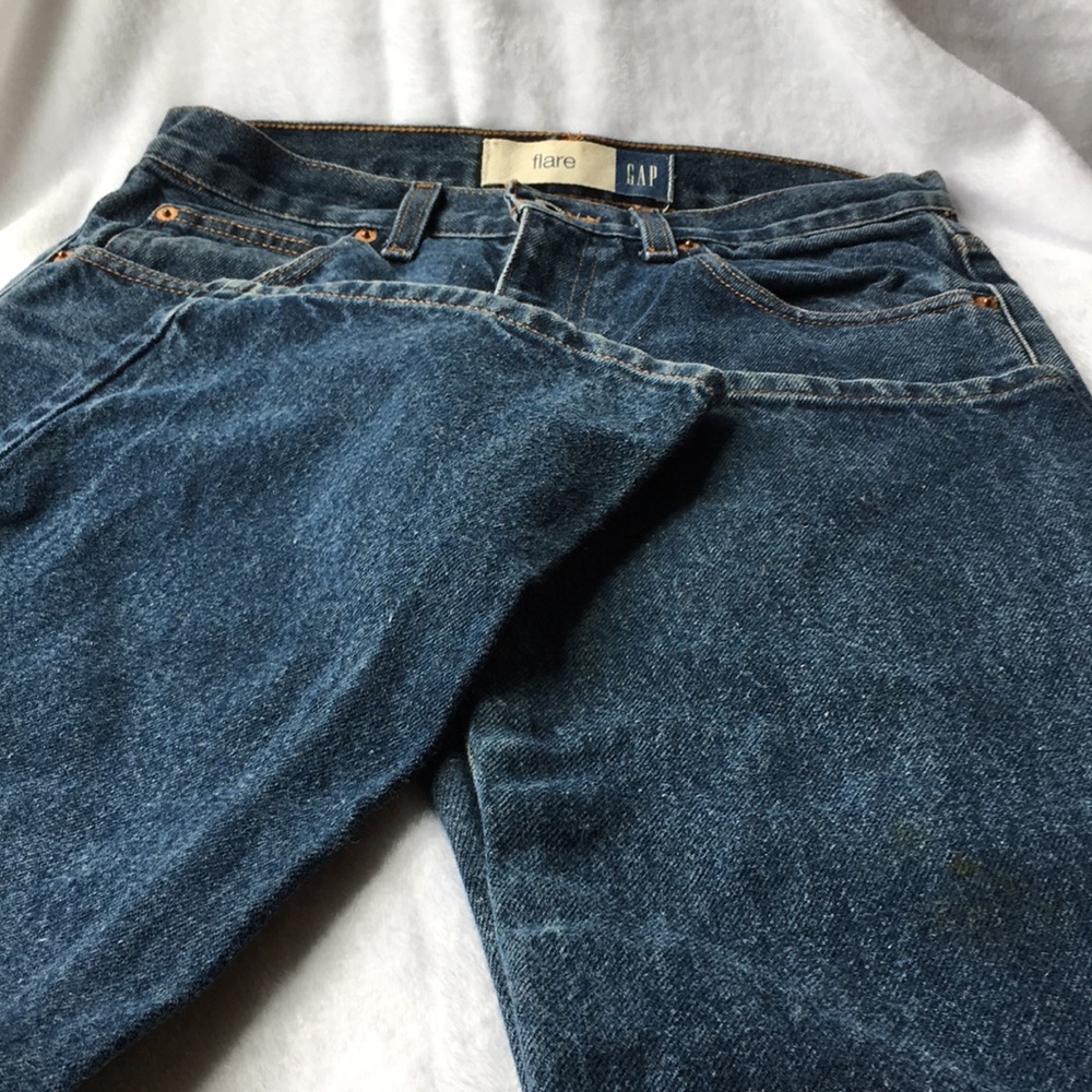 Gap woman’s flare zip and button front blue jeans size 4